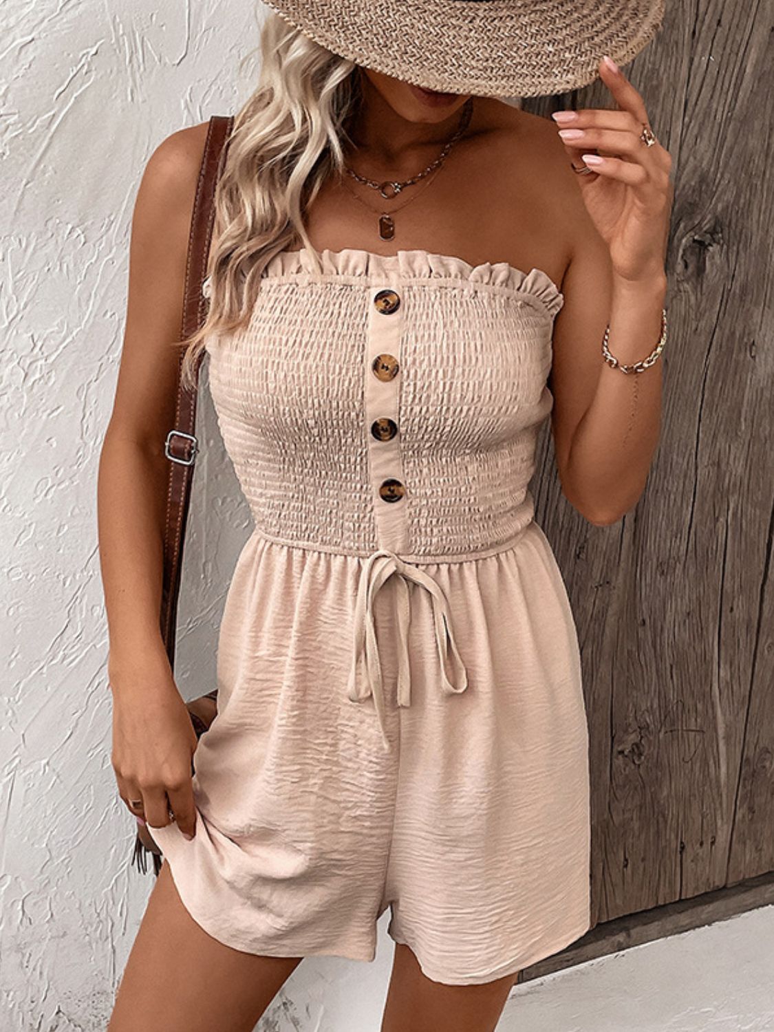 Perfee Decorative Button Smocked Strapless Romper